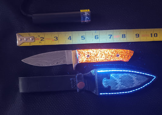 Yooperlight Knife with Damascus blade and Rattlesnake sheath