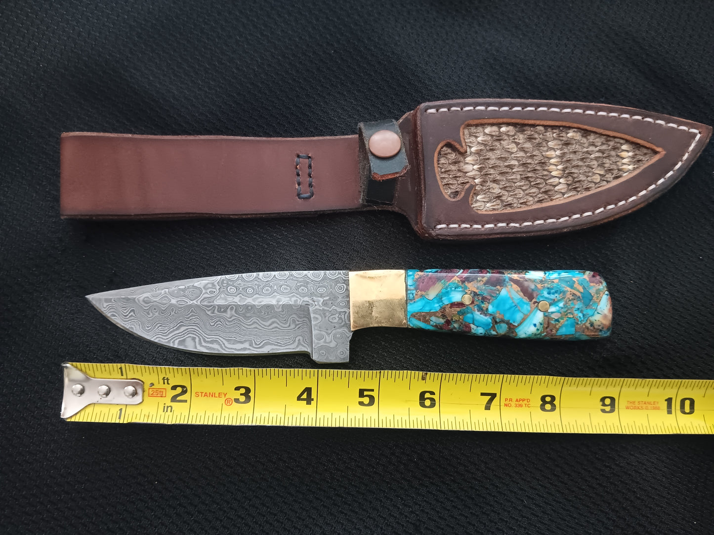 Turquoise, Brass, and Oyster Shell Composite Handle and Damascus Blade Hunting Knife with a Rattlesnake sheath